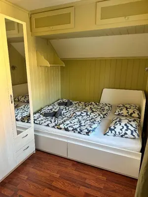 a bedroom with two beds in a bunk room at Cozy rooms with private bathroom close to Hønefoss in Knestang