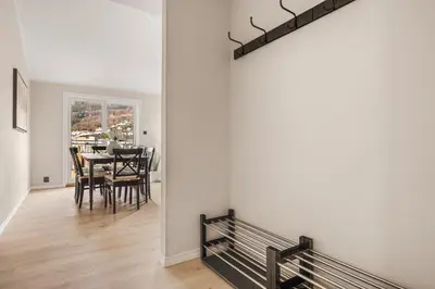 a dining room with a table and a dining roomiasm at Rosenberg Apartments in Bergen