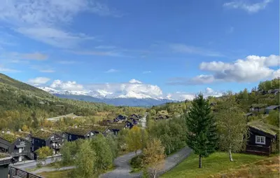 a village with houses and mountains in the background at 2 Bedroom Cozy Apartment In Stranda in Stranda