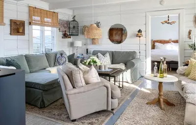 a living room with a couch and a bed at Amazing Home In Averøy With Wifi in Averoy