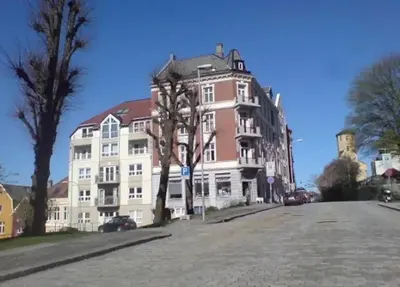 a large building on the side of a street at Nice appartment in Bergens best location in Bergen