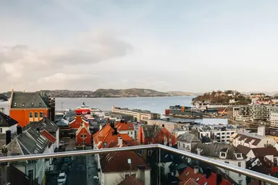 a view of a city with buildings and the water at DINBNB Apartments l Luxury Penthouse l Roof Terrace l Central Bergen in Bergen
