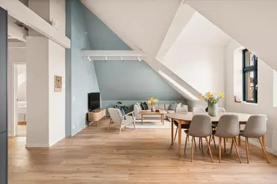 a dining room with a table and chairs at HH - Modern Apartments l City Center in Bergen
