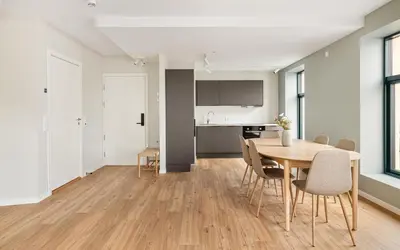 a dining room with a table and chairs at HH - Modern Apartments l City Center in Bergen
