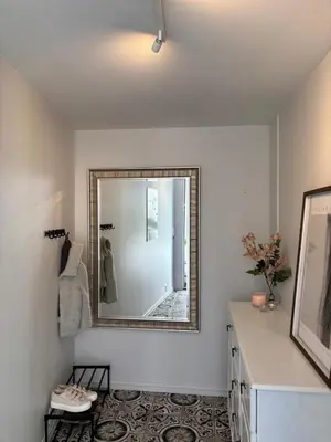 a bathroom with a mirror on the wall at Apartment behind Bryggen in Bergen in Bergen