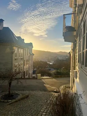a view of a street in a town with buildings at Apartment behind Bryggen in Bergen in Bergen