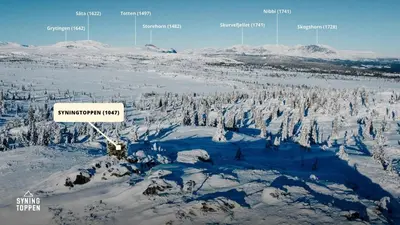 an aerial view of a snow covered mountain at Modern Cabin With Mountain View By Syningtoppen in Torpo