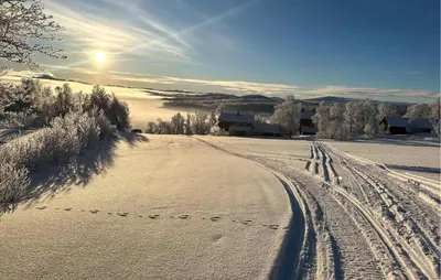 a snow covered road with footprints in the snow at Awesome Apartment In Rauland in Rauland