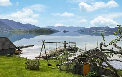 a view of a body of water with a dock at Nice Home In Valen With House Sea View in Valen