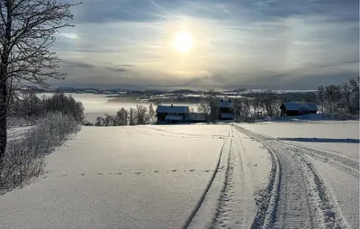 a snow covered field with tracks in the snow at Nice Apartment In Rauland With Wifi in Rauland