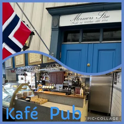 a kate pub sign in front of a store at Stor attraktiv studioleilighet i sentrum in Trondheim