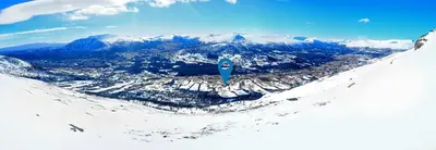 an aerial view of a snow covered mountain at Three bedroom home with an amazing mountain view! in Oppdal