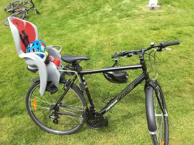 a bike parked on the grass next to a chair at Sognefjorden-Vik i Sogn in Brekka