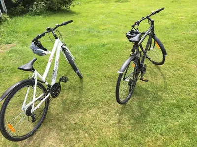 two bikes parked next to each other on the grass at Sognefjorden-Vik i Sogn in Brekka