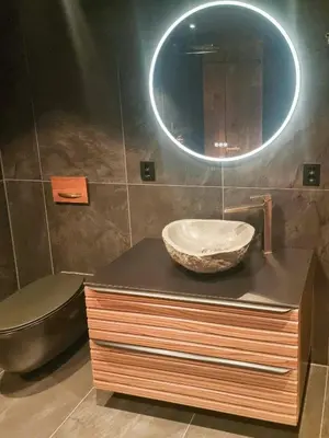 a bathroom with a sink and a mirror at Luxurious Family Cabin By The Ski Trails in Svingvoll