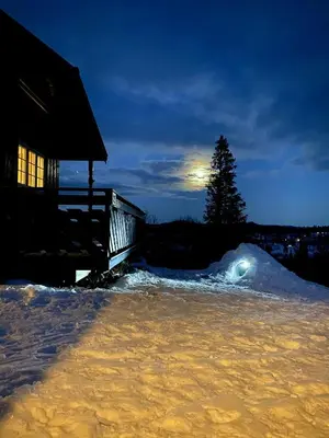 a pile of snow in front of a house at Upgraded Family Cabin At Sangefjell in Ål