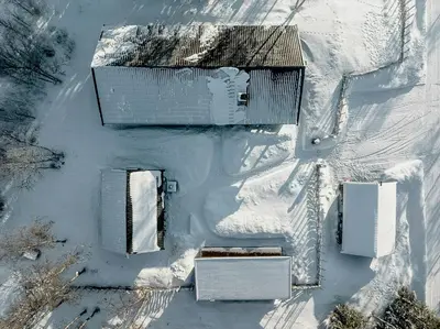an aerial view of a house covered in snow at Family Cabin With Shelter By Lake Gautetjern in Gol