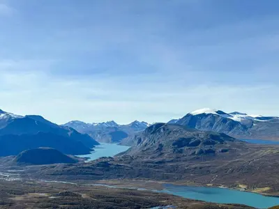 a view of a mountain range with a lake at Cabin With A View And Close To Jotunheimen in Heggenes