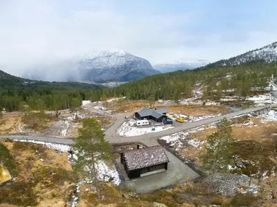 an aerial view of a house in the mountains at Hydla Mountain Lodge in Stryn