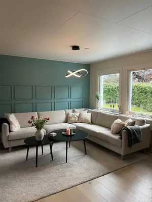 a living room with a couch and a table at Bergen - Home, Close to Airport and the city in Bergen