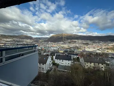 a view of a city from the balcony of a building at 2 Bedroom Apartment with free parking lot in Bergen
