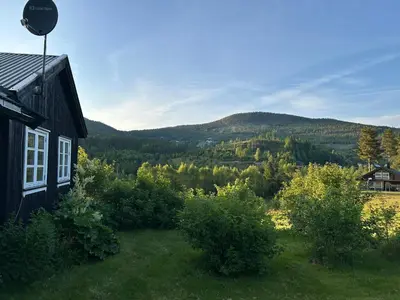 a house with a view of a mountain at Tuddal Hyttegrend, GAMLESTUGU, Telemark in Tuddal