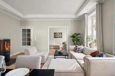 a living room with a couch and chairs at Scandinavian Luxury in Bergen's Finest Street in Bergen