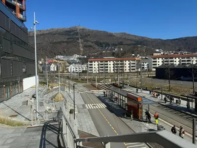a view of a city with buildings and a street at Modern, brand-new apartment in the heart of Bergen in Bergen
