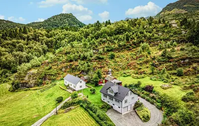 an aerial view of a house on a hill at Nice Home In Lundegrend With Wifi in Grimsland