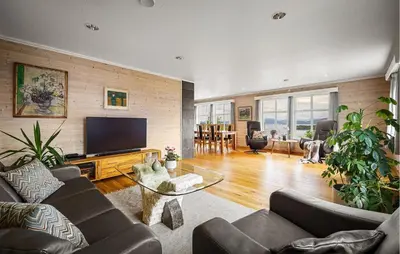 a living room with a couch and a flat screen tv at Nice Home In Lundegrend With Wifi in Grimsland