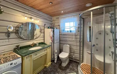a bathroom with a shower and a sink and a toilet at Nice Home In Sjusjøen With Wifi in Sjusjøen