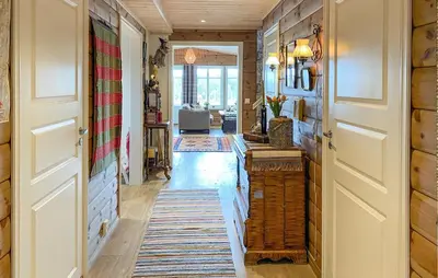 a hallway of a home with a door and a rug at Gorgeous Home In Oppdal With Wifi in Oppdal