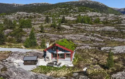 an aerial view of a small house on a mountain at Lovely Home In Masfjordnes With Sauna in Masfjorden
