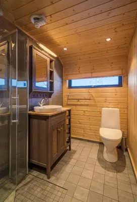 a bathroom with a toilet and a sink at Liapark in Ål