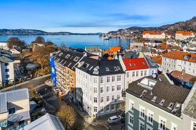 an aerial view of a city with a body of water at Rom i loftsleilighet med utsikt in Bergen