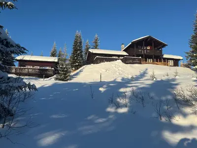 a house on a hill covered in snow at Skeitunet in Svingvoll