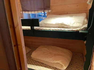 a room with two bunk beds in it at Syndinstøga in Ryfoss