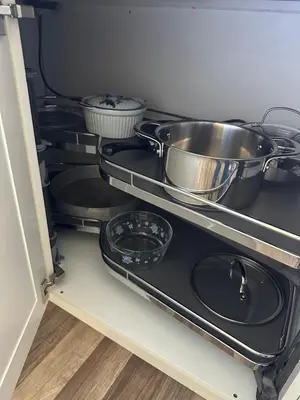 a kitchen with two pots and pans on a stove at Maria apartment with Sauna Otta in Otta