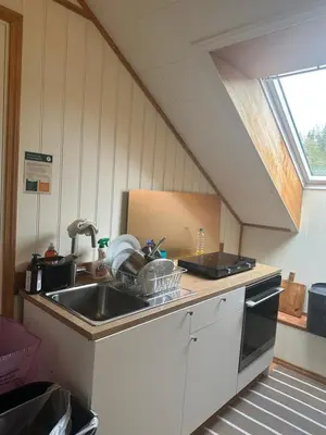 a kitchen with a sink and a counter top at Comfortable room - Double bed - Private bathroom - Free parking - Shared kitchen - Bus stop and store 2 min walk in Lunden