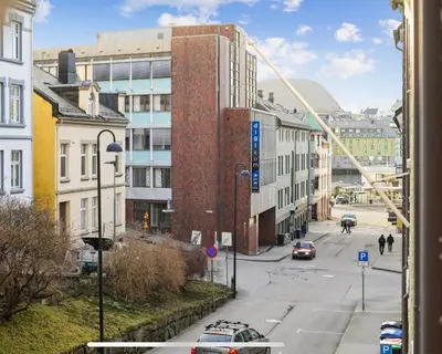 a view from a window of a street with buildings at Nouveau Nook in Ålesund