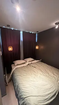 a bedroom with a large bed in a room at One bedroom apartment close to Asker centrum in Lii