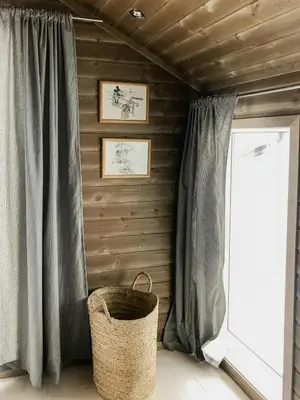 a wicker basket in a room with a window at Modern Cabin With Breathtaking View At Norefjell in Eggedal