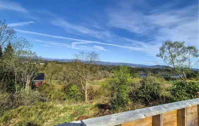 a view of a field with trees and a fence at Awesome Home In Sletta With Wifi in Sletta