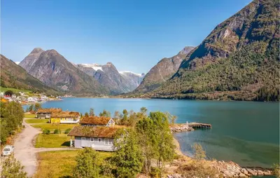 a view of a lake with mountains in the background at Gorgeous Home In Fjærland in Fjarland