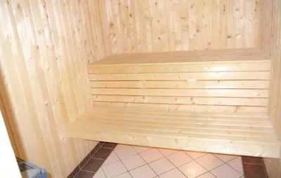 a sauna with a wooden wall in a room at Amazing Home In Hemsedal With Sauna in Hemsedal
