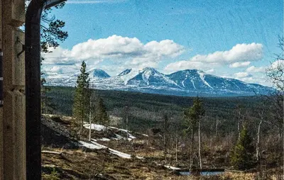 a view of snow covered mountains from a window at 2 Bedroom Awesome Home In Engerdal in Kvisla