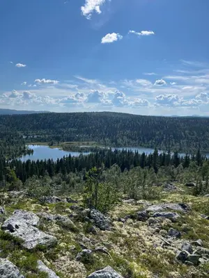 a view of a lake from the top of a mountain at Kvitfjell mountain in Strande