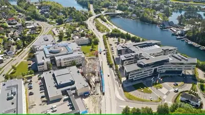 an aerial view of a city with a river and buildings at Ålesund Campus Apartments in Ålesund
