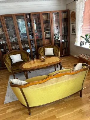 a living room with a couch and a table at Panorama Stryn in Stryn