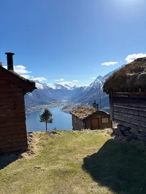 a view of a lake with mountains in the background at Faleide Grandview in Stryn